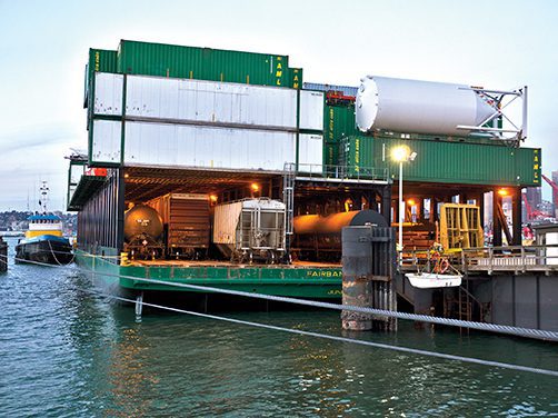 Shipping oversized cargo via barge service.